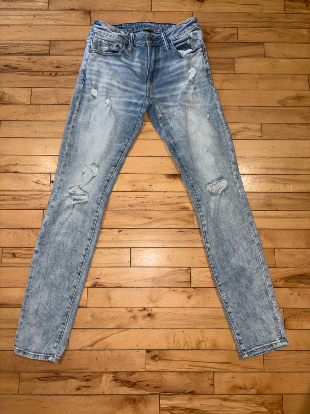 American Eagle Outfitters Light Wash Skinny Jeans with Distressed Details